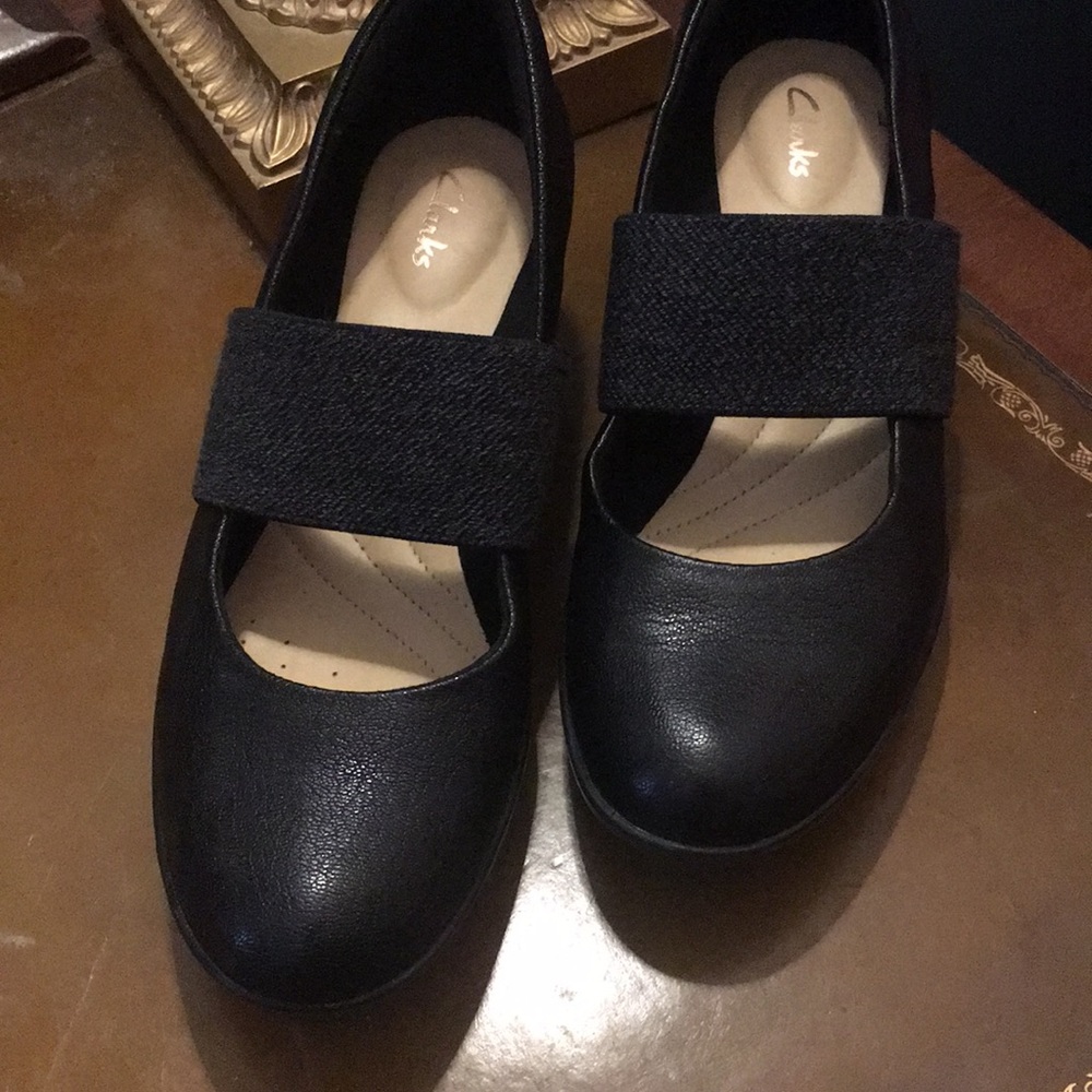 Clark's ladies black wedge slip on